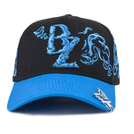 Gorra Si Sabe - BAEZ X BLESSD