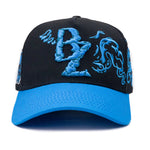 Gorra Si Sabe - BAEZ X BLESSD